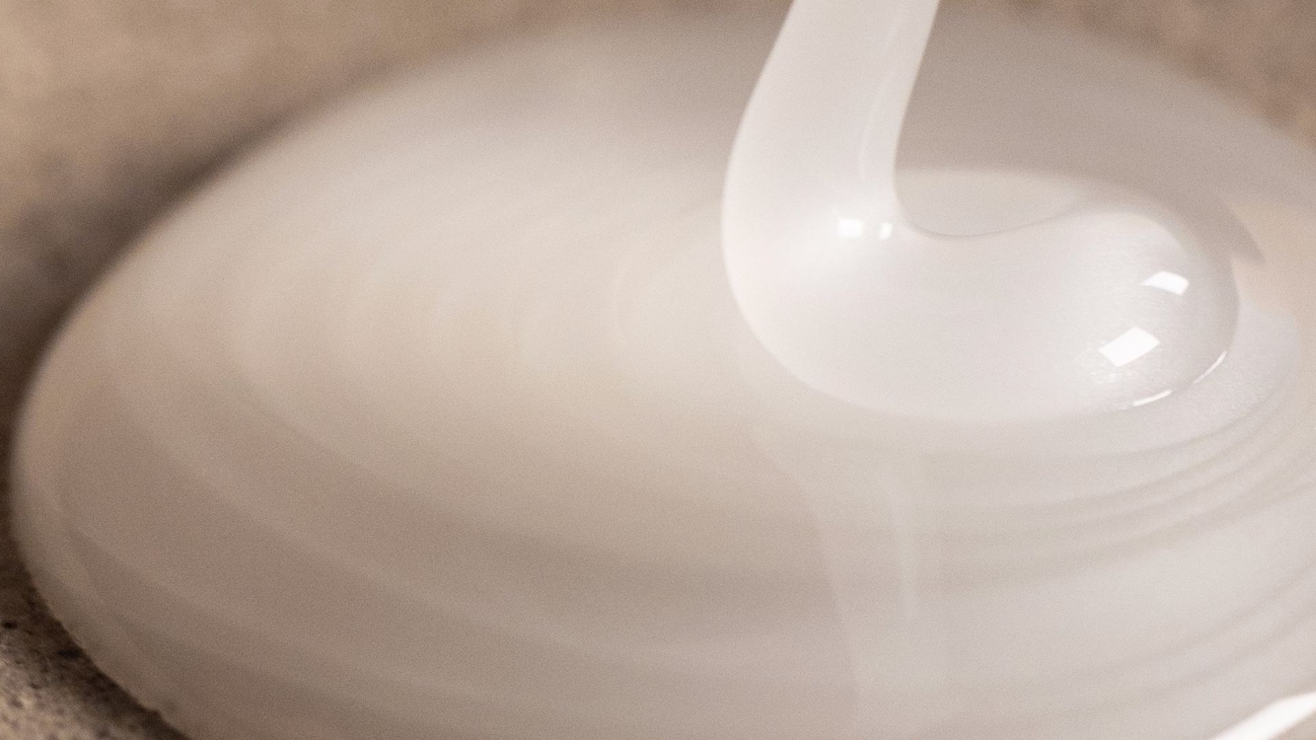 Close-up of a white ceramic bowl with a smooth surface